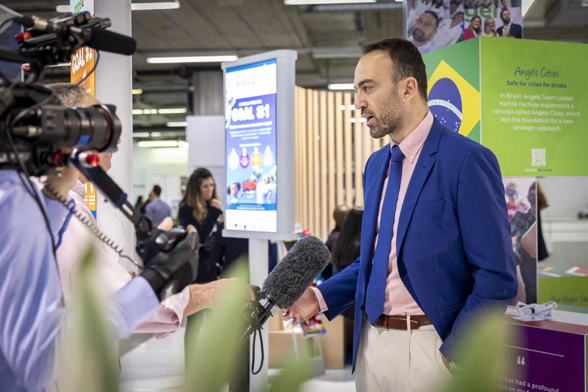 Dr. Apostolos Safouris speaking during an international stroke-care event